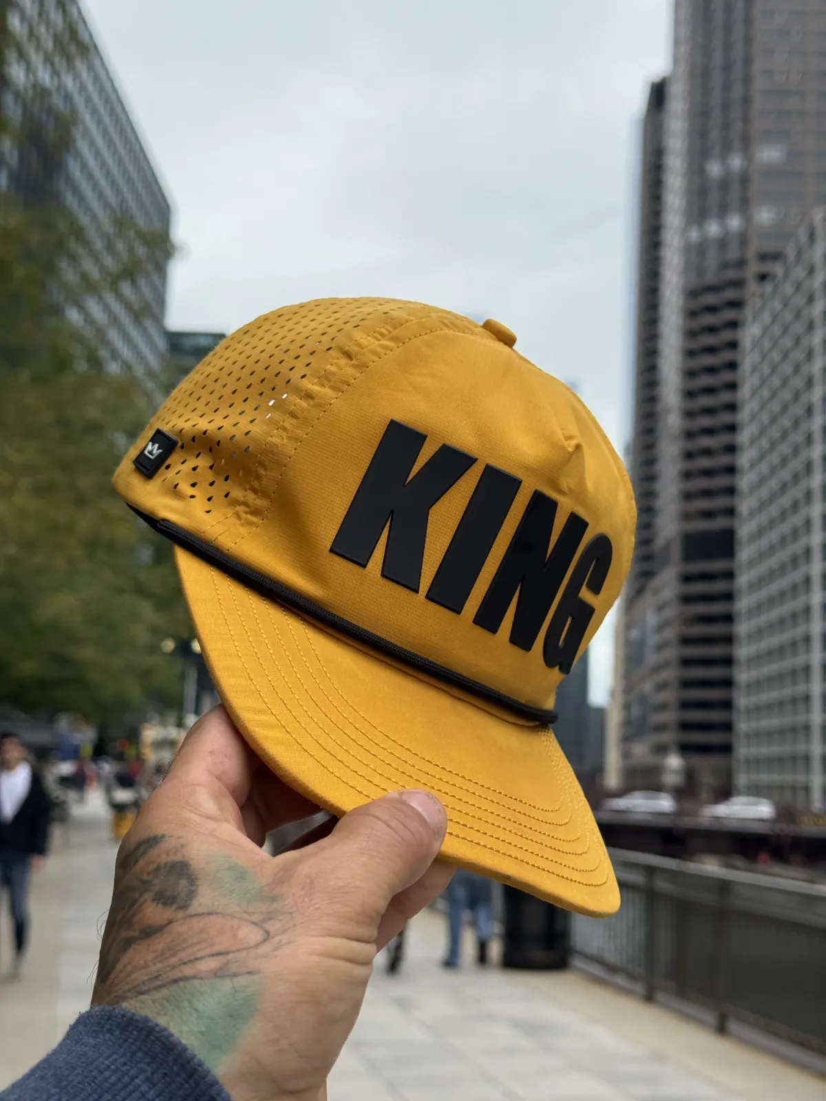 Yellow KING hat in the city